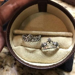 2 crown sterling silver rings size 7..